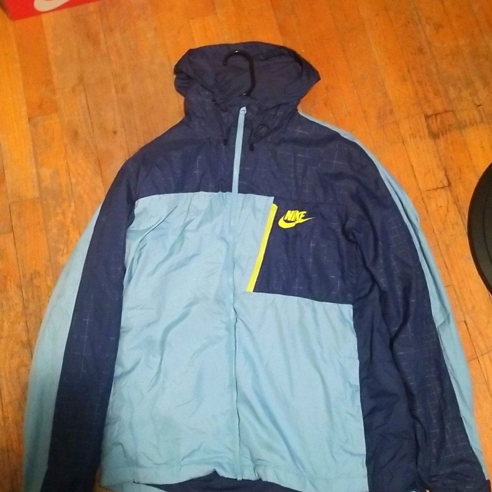 Blue Nike coat size Large.